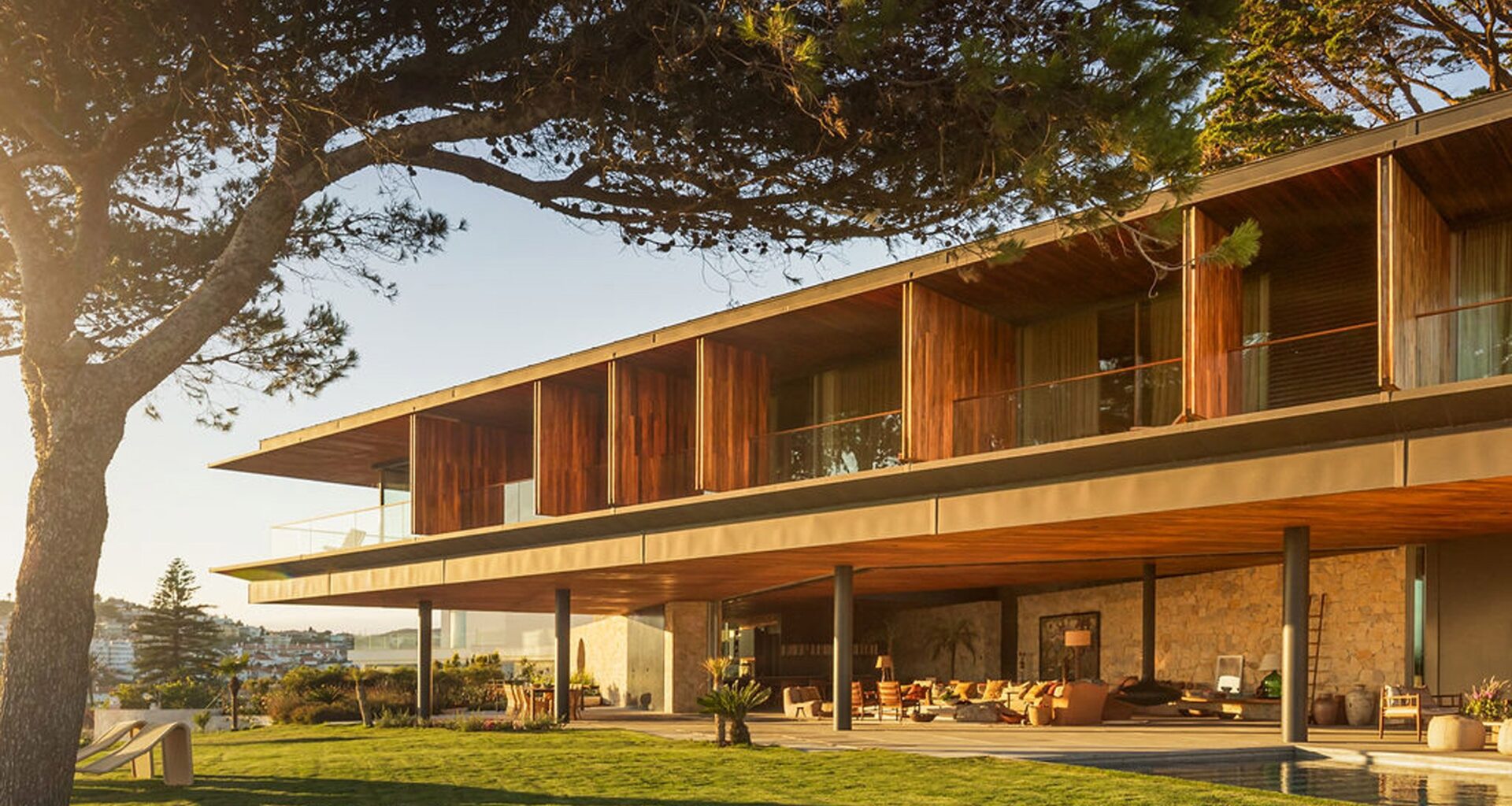 Bernardes Arquitetura's Casa Tejo "gazes entirely towards the sea"