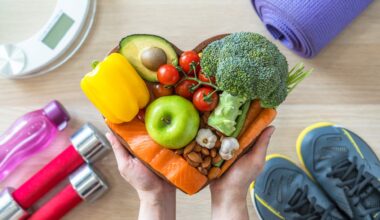 Healthy lifestyle on ketogenic diet, eating clean keto food good health dietary in heart dish with aerobic body exercise, gym workout training class , weight scale and sports shoes in fitness center