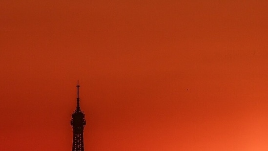 (FILES) The sun in Paris on July 1