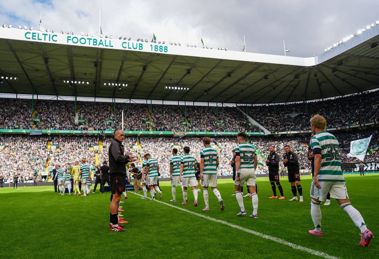 Callum McGregor delivers the trophy
