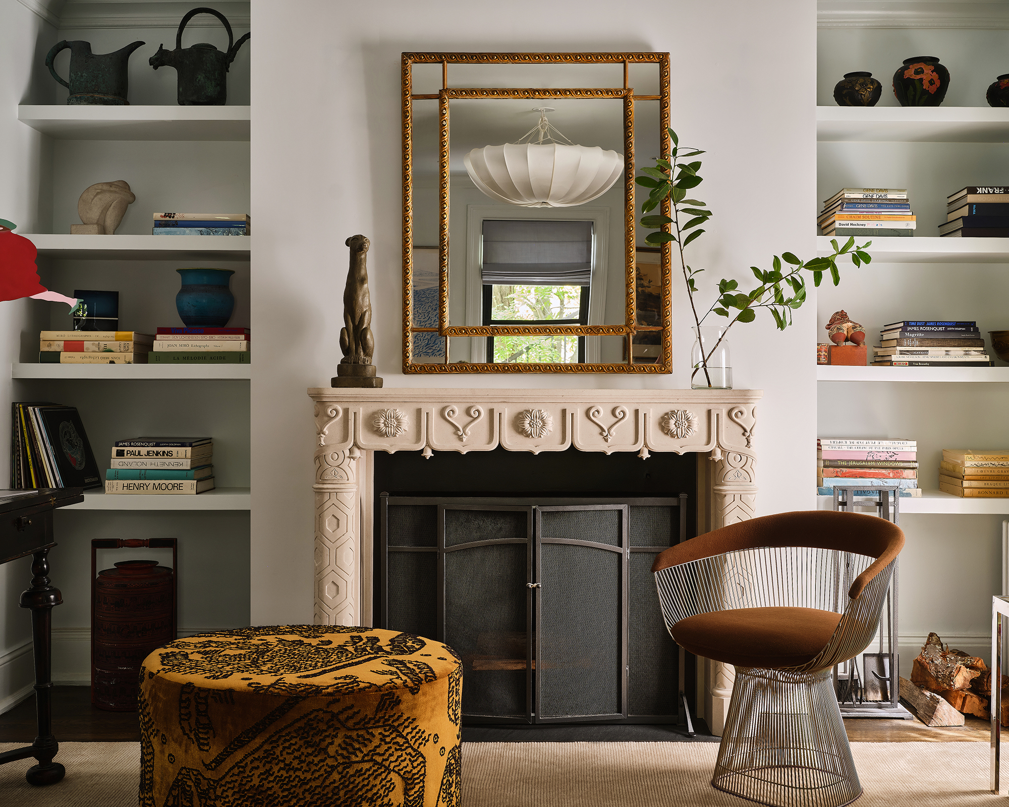 gray living room with fireplace and modern furniture