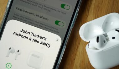 A close-up of a smartphone screen showing a Bluetooth connection to "John Tucker