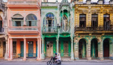 a photograph by James Kerwin of colorful buildings in Cuba