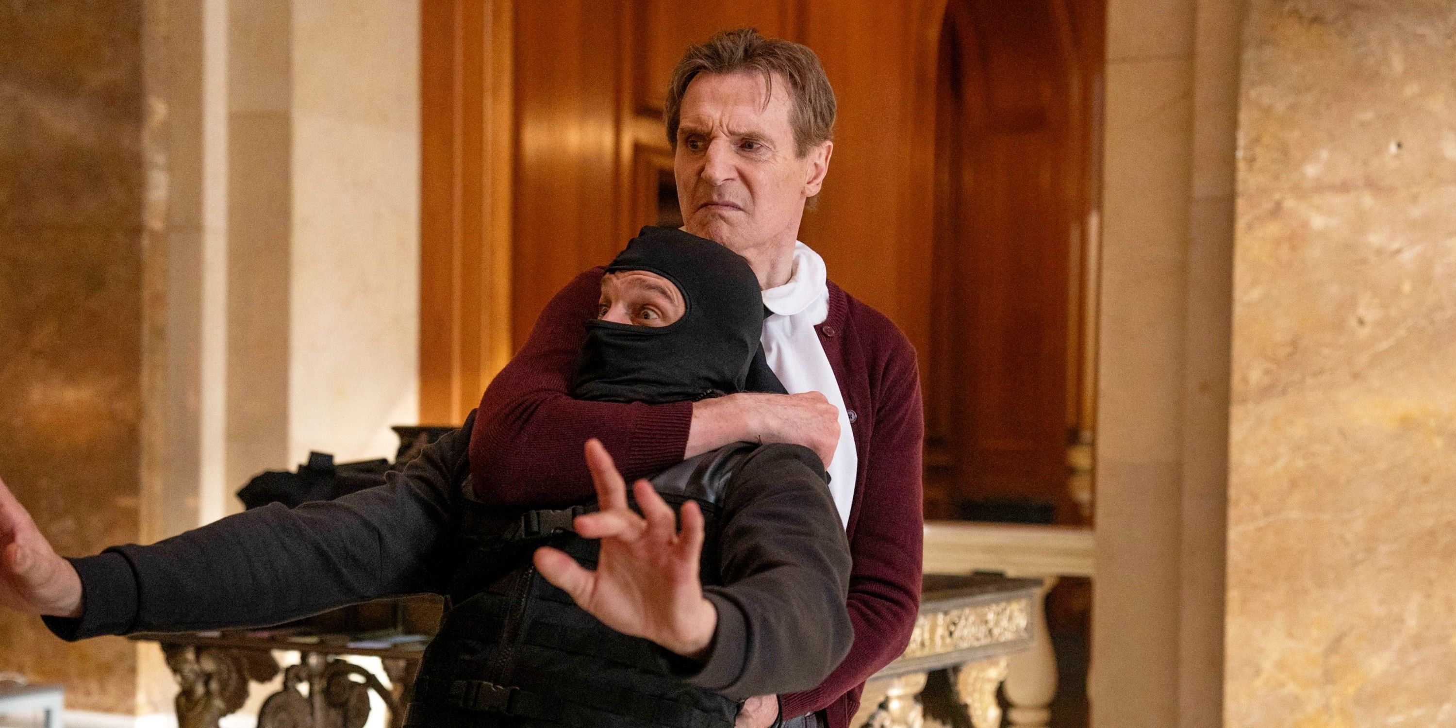 Liam Neeson beating up someone at the bank in The Naked Gun