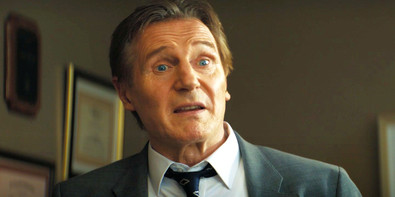 Liam Neeson talking to his superior in Naked Gun