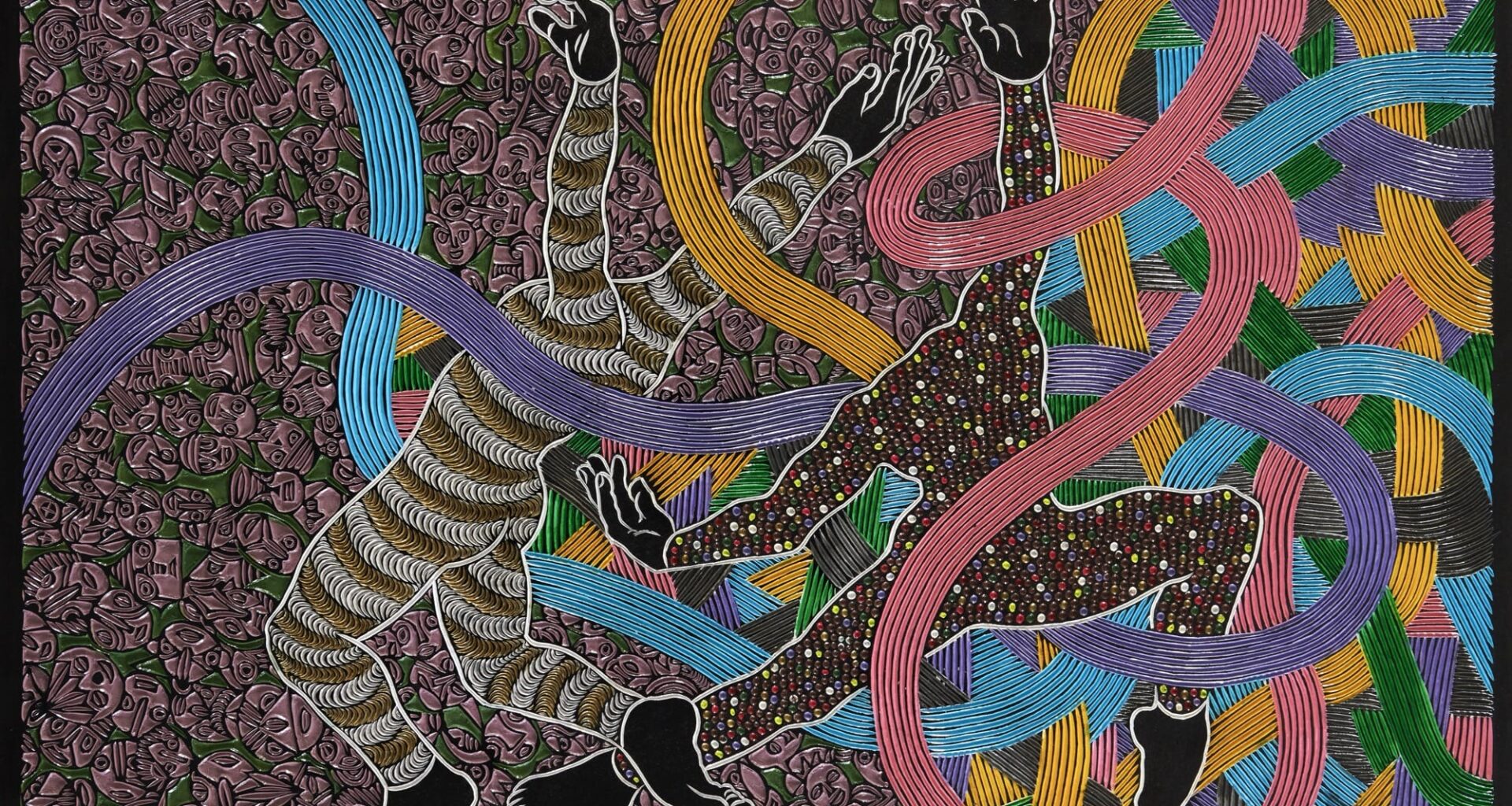 An abstract painting carved from wood with geometric patterns and two headless figures.