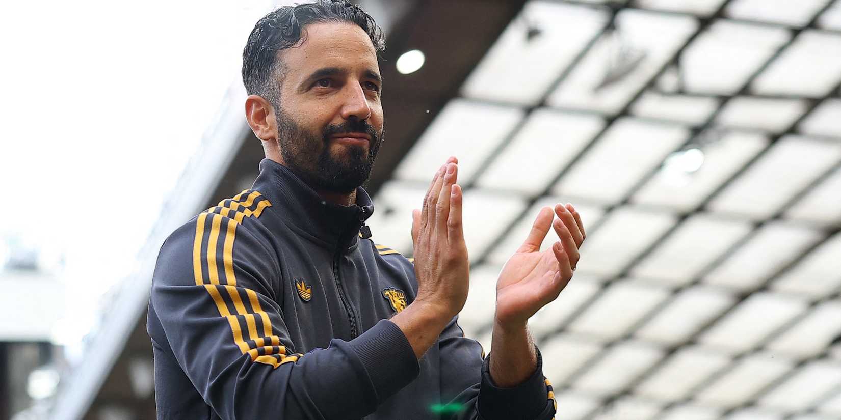 Manchester United manager Ruben Amorim applauds fans after the match