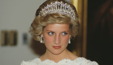 Princess Diana wears a white lace bateau neck dress with the Spencer Tiara
