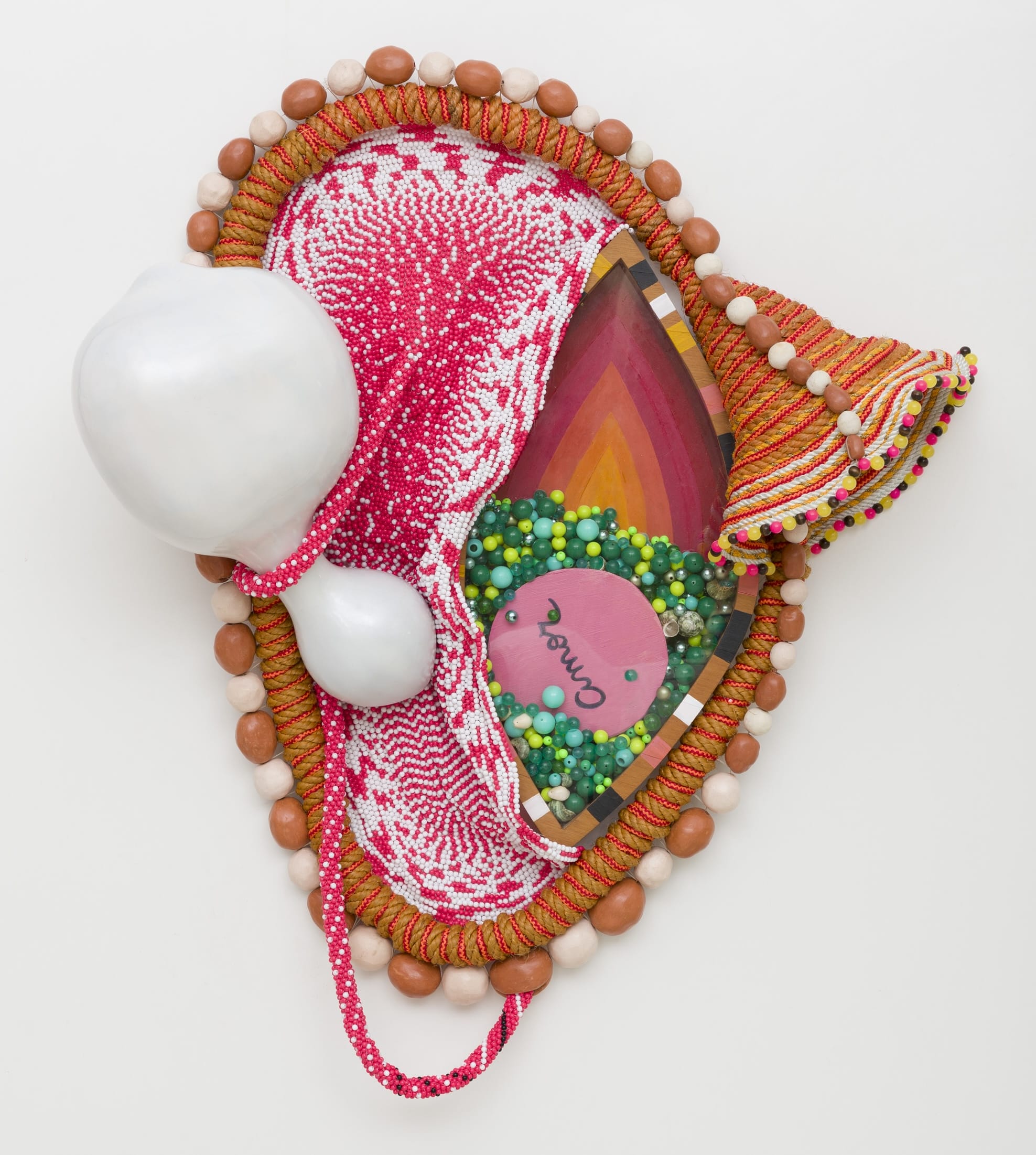an abstract, mostly pink sculpture by Maria Nepomuceno made of beads, resin, wood, and string