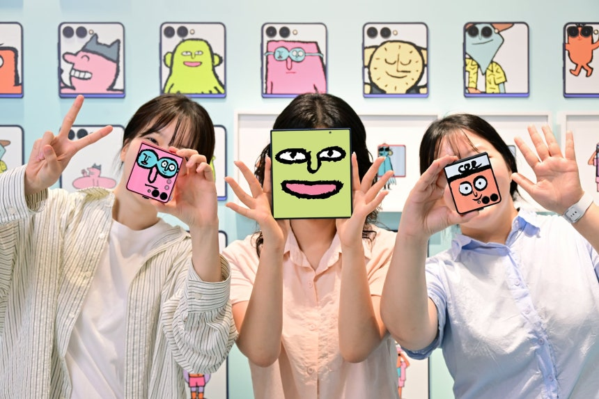 Visitors try out the Galaxy Z Fold 7 and Flip 7 at a foldable phone experience zone jointly created by Samsung Electronics and French artist Jean Julien. (Samsung Electronics)