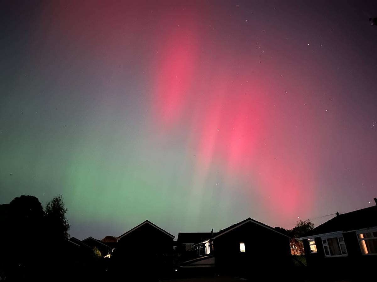 northern lights above houses in westhoughton, greater manchester