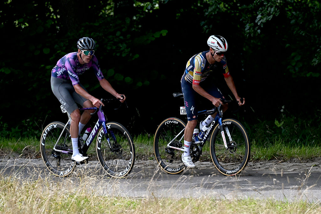 WALBRZYCH, POLAND - AUGUST 06: (L-R) Kelland O'Brien of Australia and Team Jayco AlUla and Pepijn Reinderink of Netherlands and Team Soudal Quick-Step compete in the breakaway during the 82nd Tour de Pologne 2025, Stage 3 a 159.3km stage from Walbrzych to Walbrzych / #UCIWT / on August 06, 2025 in Walbrzych, Poland. (Photo by Luc Claessen/Getty Images)