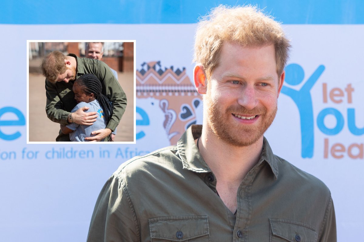Prince Harry Hugs Child at Sentebale Center