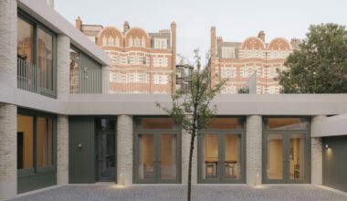 20 Newcourt Street, by Wendover, a london development of old and new with round columns and brick frontage