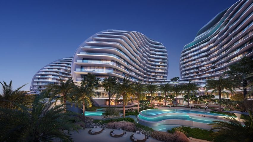 View of white curved housing project in UAE