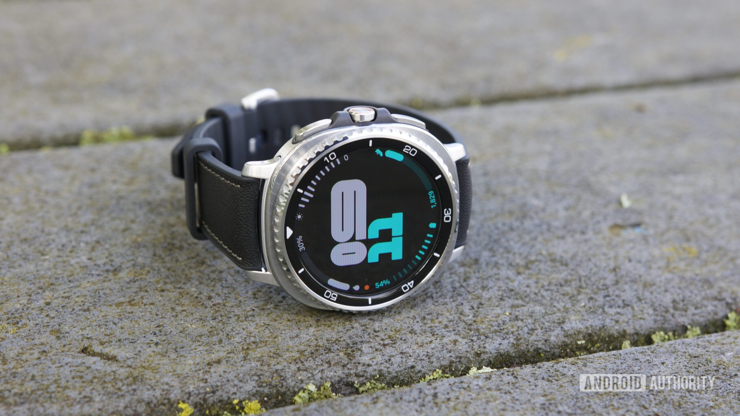 The Galaxy Watch 8 Classic sitting on its side with its display on.