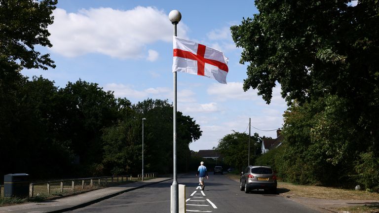 The St George's flag hangs from a lamppost in Harlow. Pic: Reuters