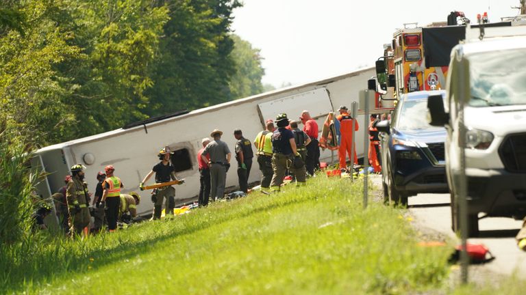 Some passengers remain trapped in the wreckage of the bus. Pic: Buffalo News/AP
