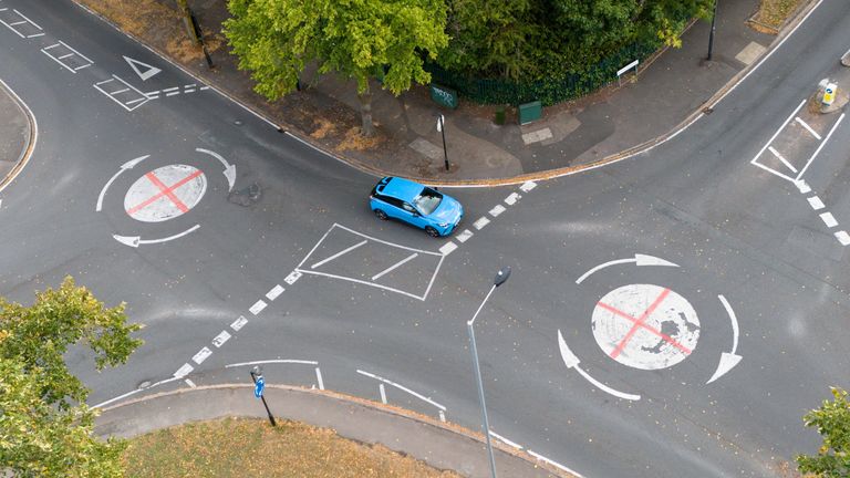 Roundabouts painted as St George's flags in Yardley Wood, Birmingham. Pic: PA