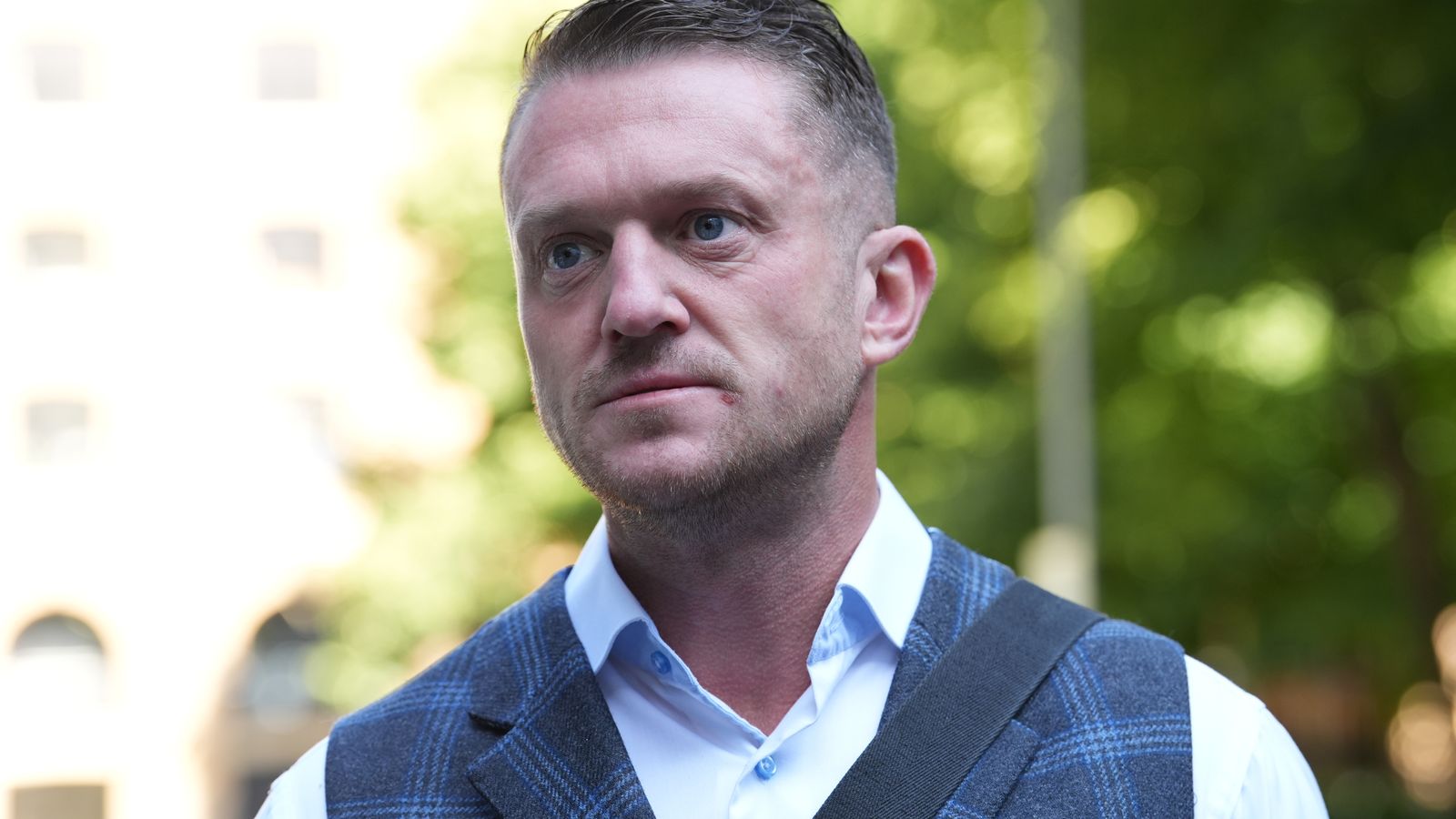 Man arrested on suspicion of GBH after video appeared to show activist Tommy Robinson walking near scene | UK News