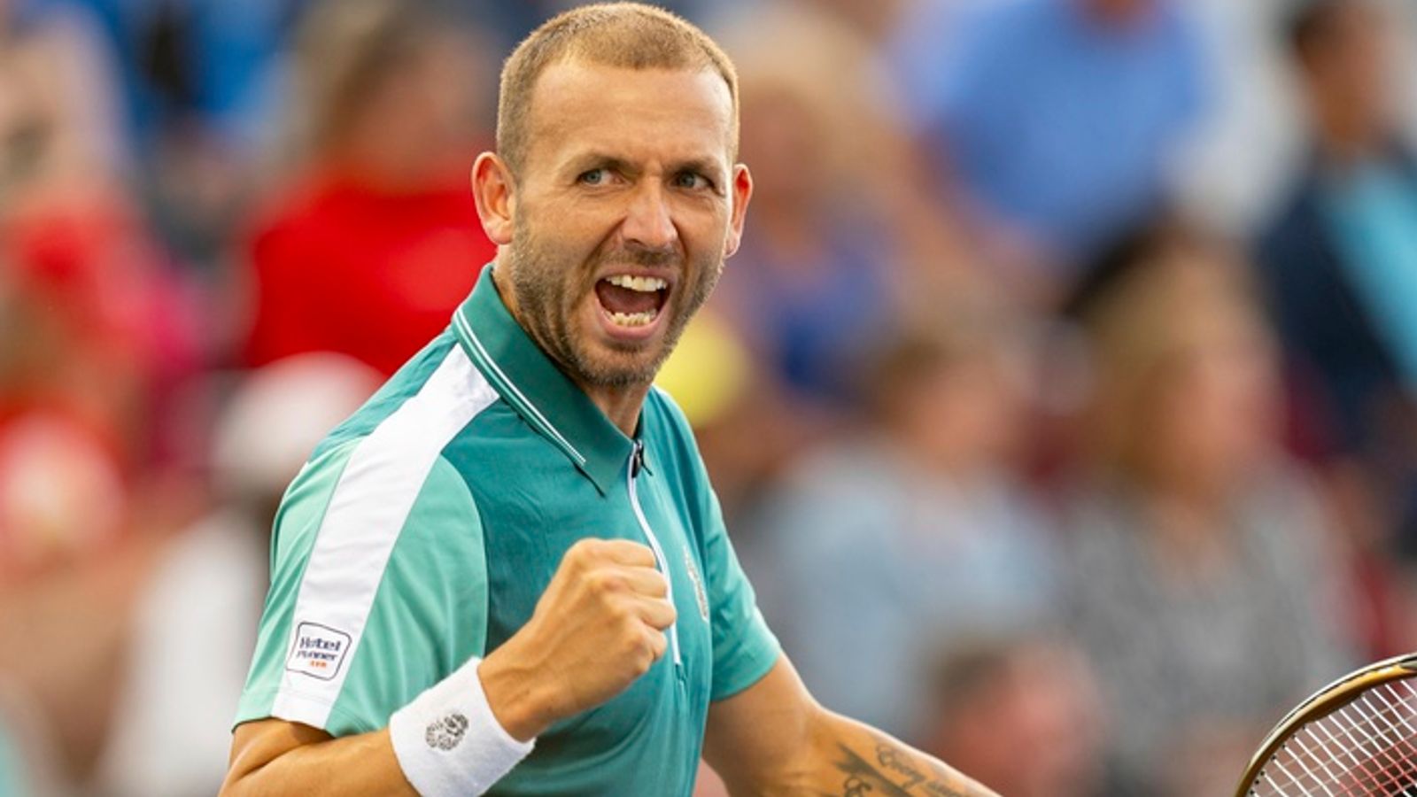 Dan Evans of Great Britain reacts after winning a point during his first round match of the National Bank Open, part of the Hologic ATP Tour