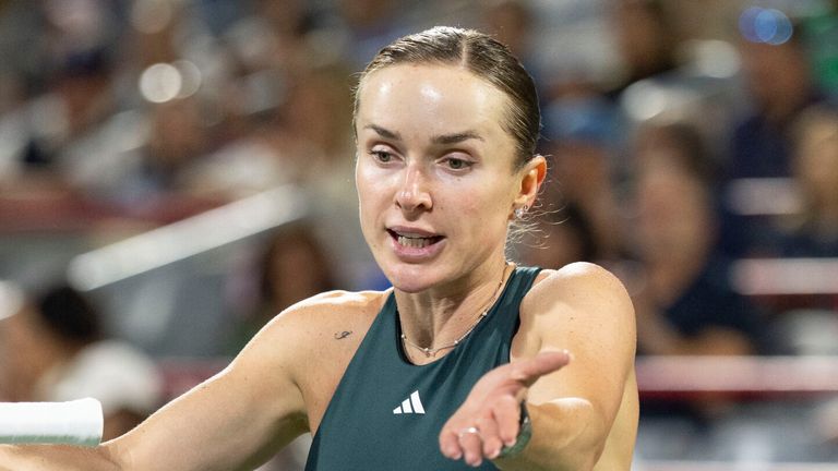 Elina Svitolina, of Ukraine, reacts during her game against Naomi Osaka, of Japan, during quarterfinal tennis action at the National Bank Open in Montreal, Tuesday, Aug. 5, 2025. (Christinne Muschi/The Canadian Press via AP)