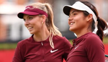 Katie Boulter (GBR) with Emma Raducanu (GBR) during their women's doubles Round 2 match against Lyudmila Kichenok (UKR) and Erin Routliffe