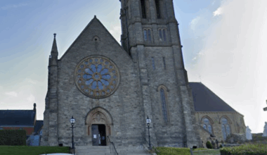 Priest left in 'serious condition' after being attacked in church with bottle