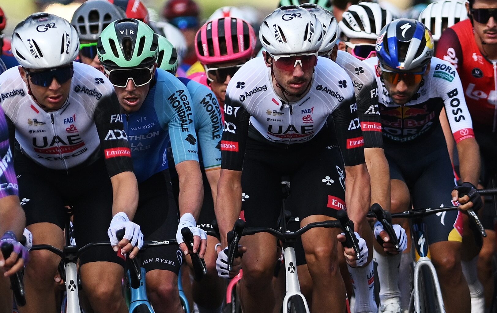 LEGNICA, POLAND - AUGUST 04: (L-R) Stan Dewulf of Belgium and Team Decathlon AG2R La Mondiale and Brandon McNulty of The United States and UAE Team Emirates - XRG compete during the 82nd Tour de Pologne 2025, Stage 1 a 199.7km stage from Wroclaw to Legnica on August 04, 2025 in Legnica, Poland. (Photo by Luc Claessen/Getty Images)