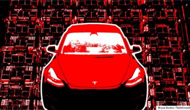Image of a red Tesla over a supercomputer AI training cluster.