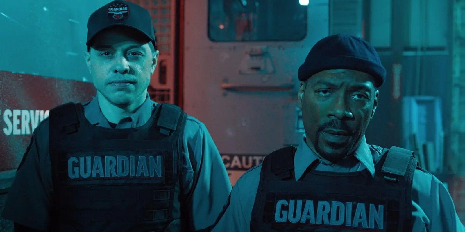 Pete Davidson and Eddie Murphy standing side by side in The Pickup