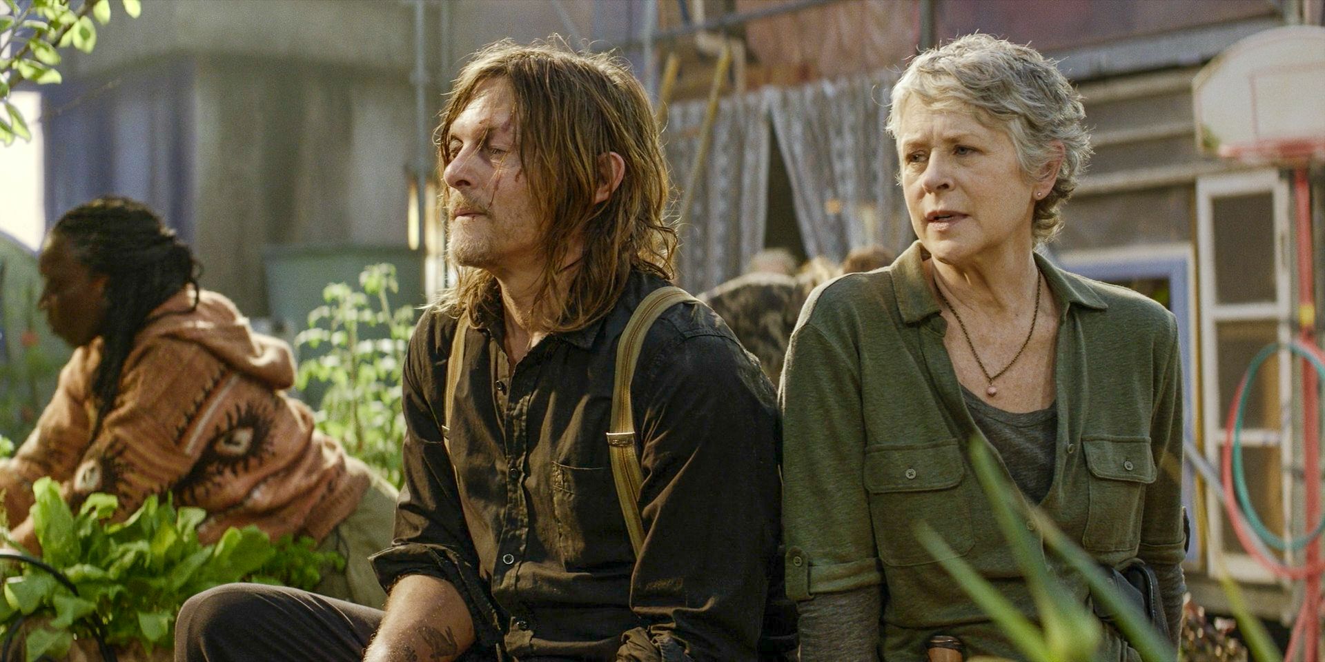 Daryl (Norman Reedus) and Carol (Melissa McBride) looking thoughtful in The Walking Dead: Daryl Dixon Season 2 Ep 5