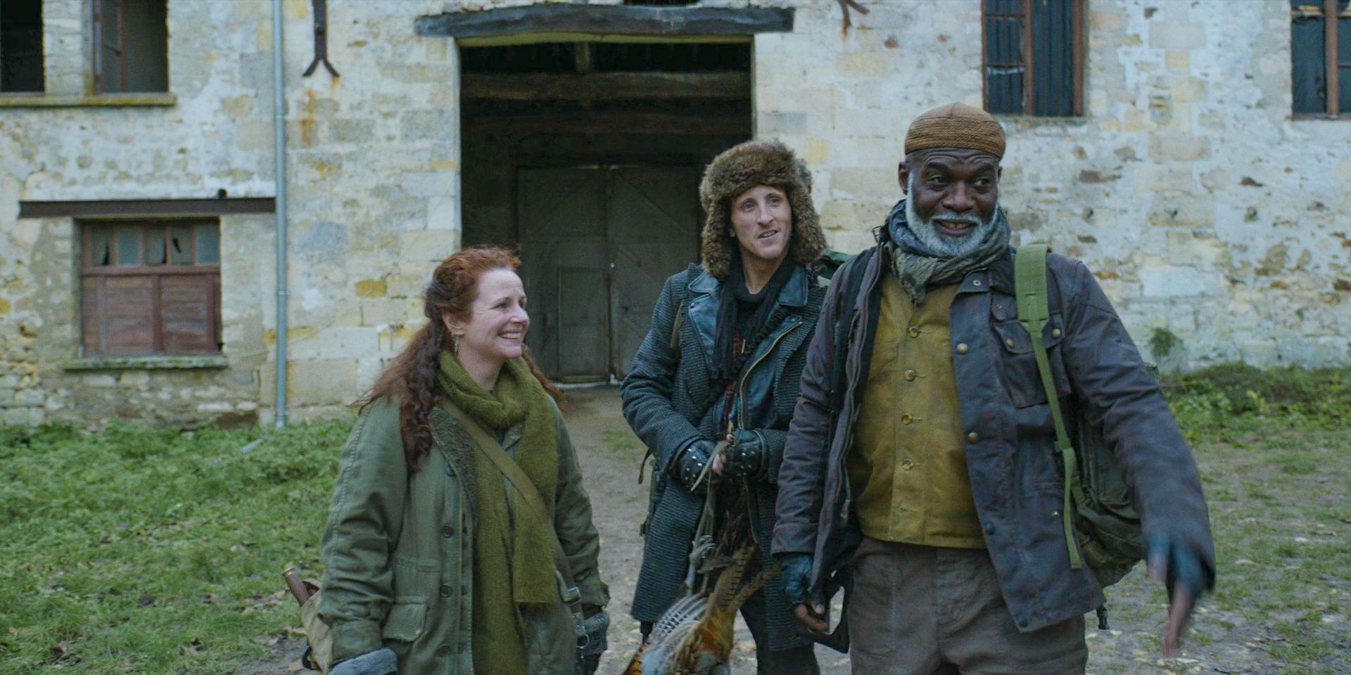 Fallou Boukar (Eriq Ebouaney) introduces Fiona (Sarah McCardie) and Angus (Matt Swift) in The Walking Dead: Daryl Dixon Season 2 Ep 6