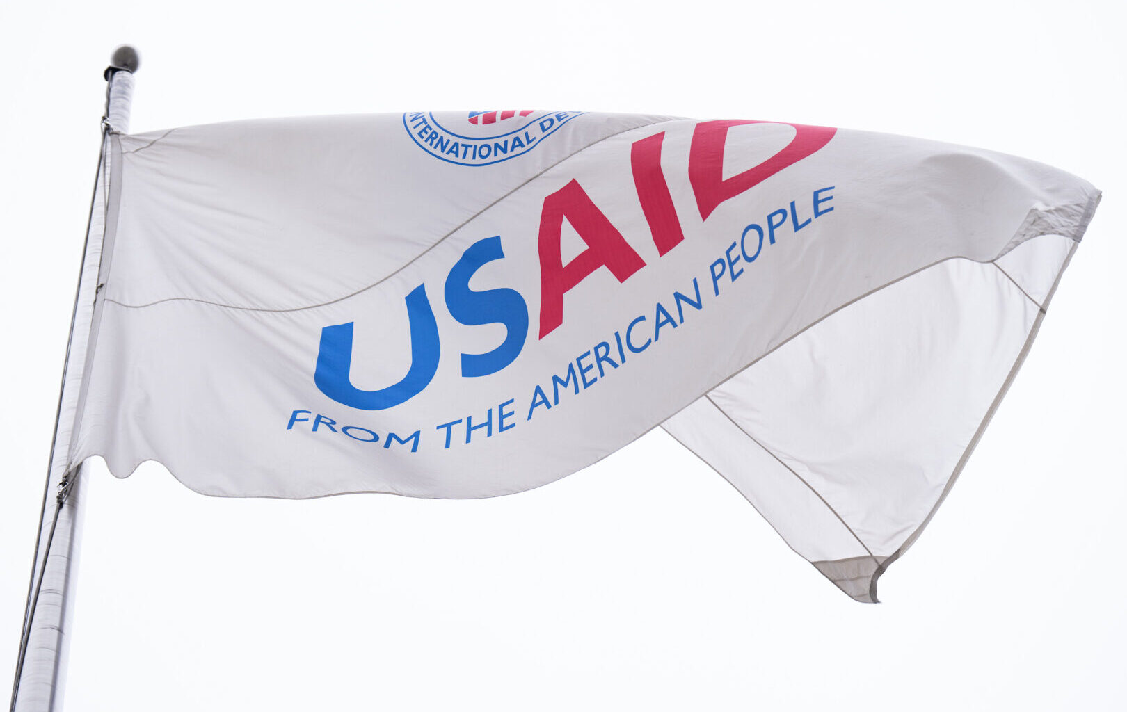 The United States Agency for International Development (USAID) flag flies outside the headquarters in Washington on Feb. 3, 2025. (Bill Clark/CQ Roll Call)