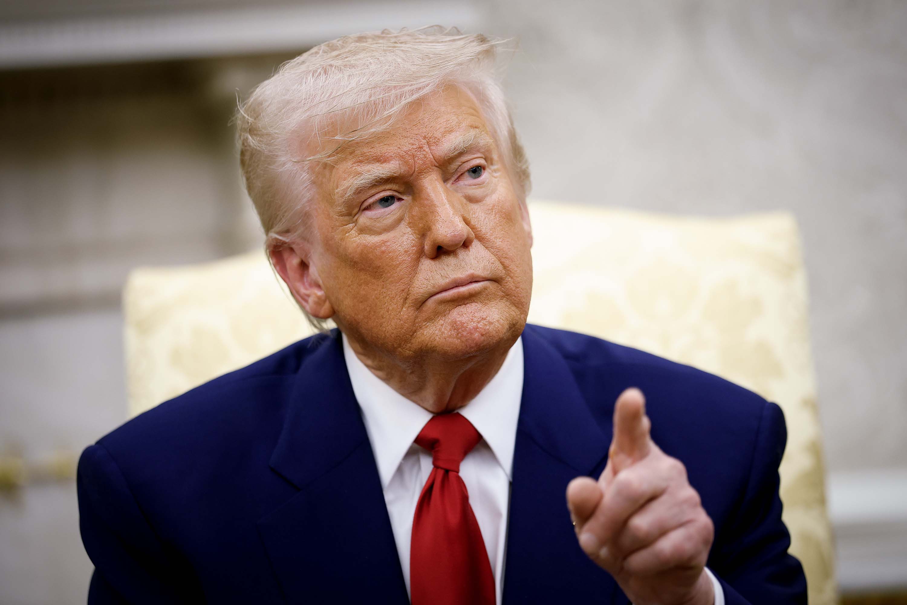 WASHINGTON, DC - APRIL 07: U.S. President Donald Trump takes a question from a member of the media during a meeting with Israeli Prime Minister Benjamin Netanyahu in the Oval Office of the White House on April 7, 2025 in Washington, DC. President Trump is meeting with Netanyahu to discuss ongoing efforts to release Israeli hostages from Gaza and newly imposed U.S. tariffs.
