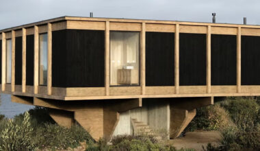 concrete spiral staircase raises lote studio’s casa CG in chile
