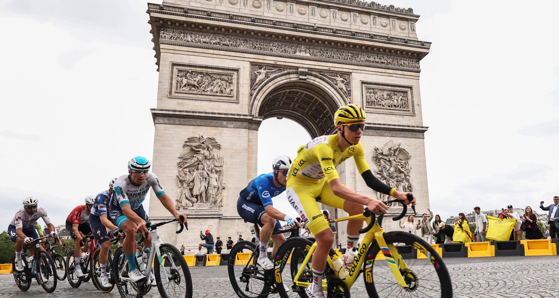 Tadej Pogačar passes the Arc de Triomphe on stage 21 of the 2025 Tour de France