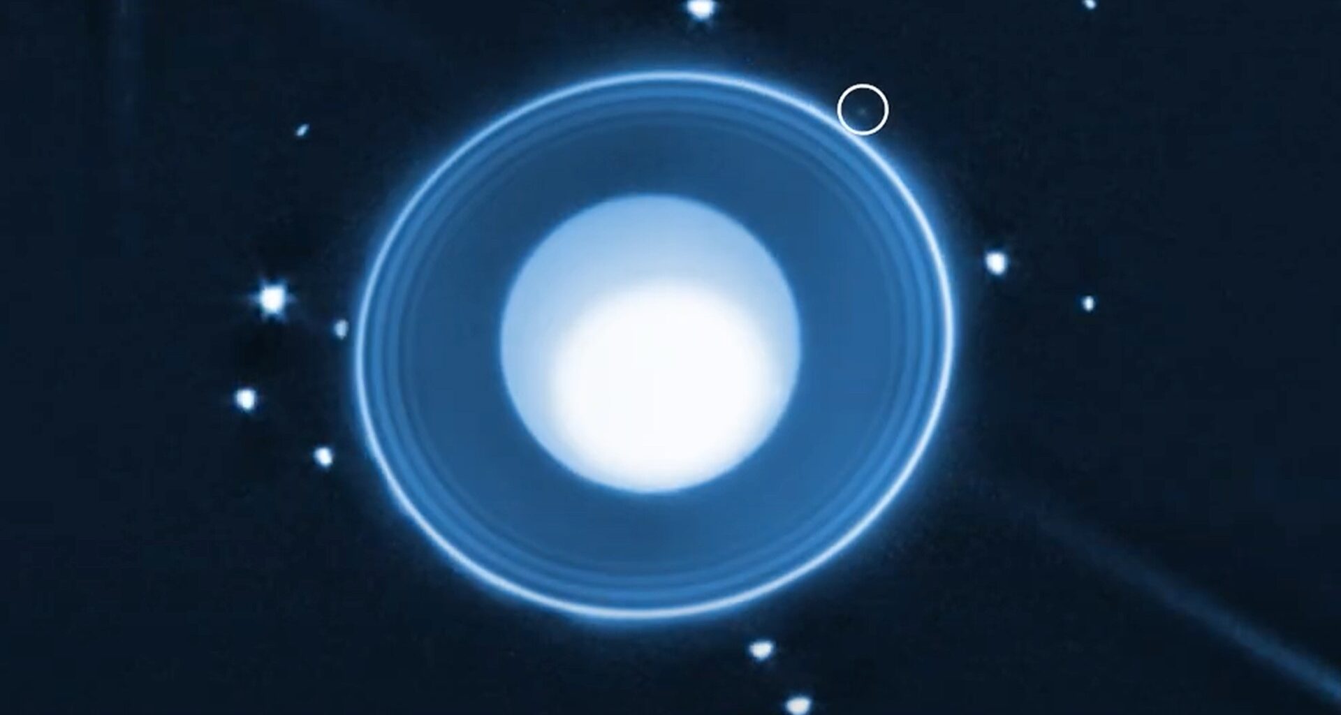 a blue orb surrounded by white dots