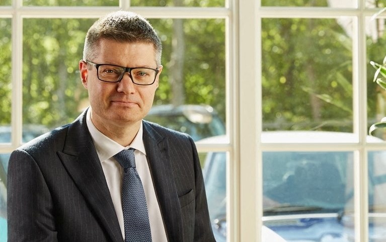 Simon Wolfson, Next CEO, posing for a portrait.