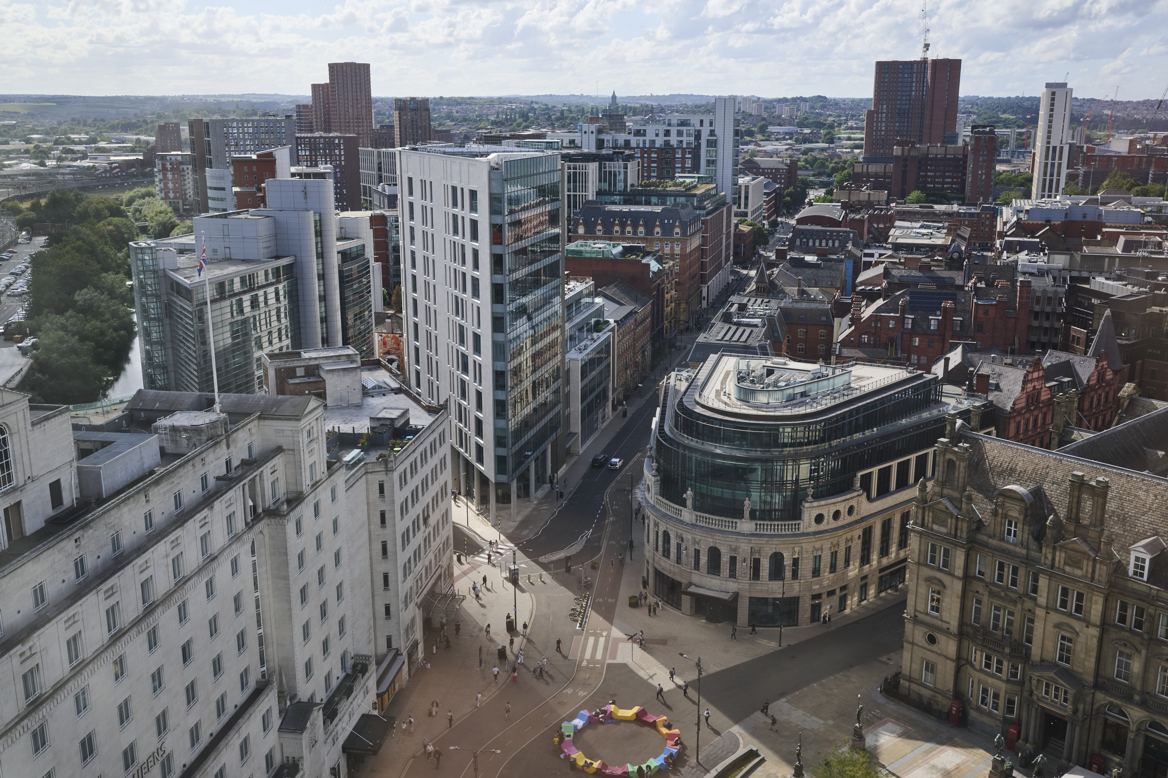 Aerial view of Leeds city center, showing City Square and Wellington Place.