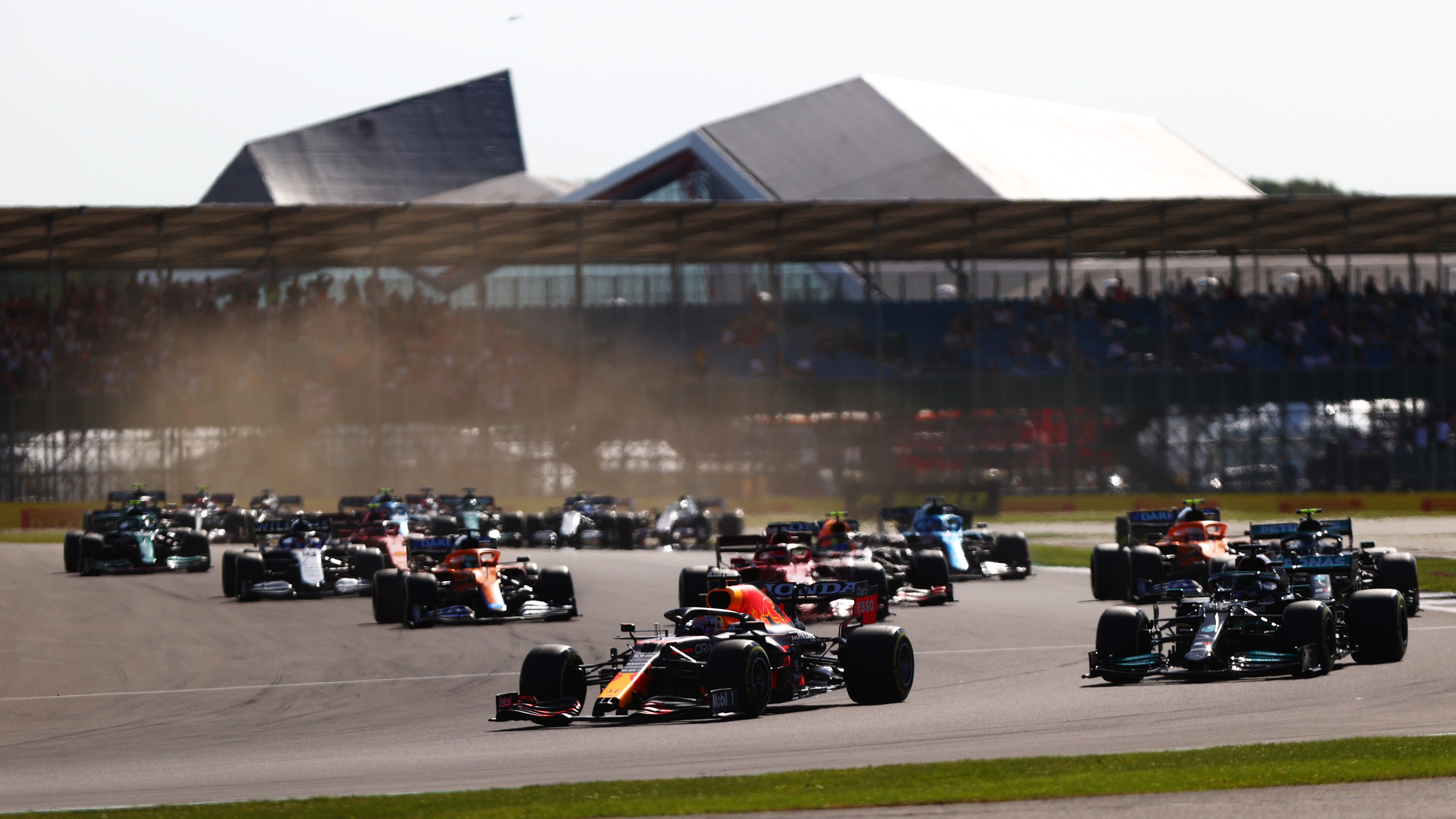 Max Verstappen leading Lewis Hamilton at the start of the F1 British Grand Prix sprint.