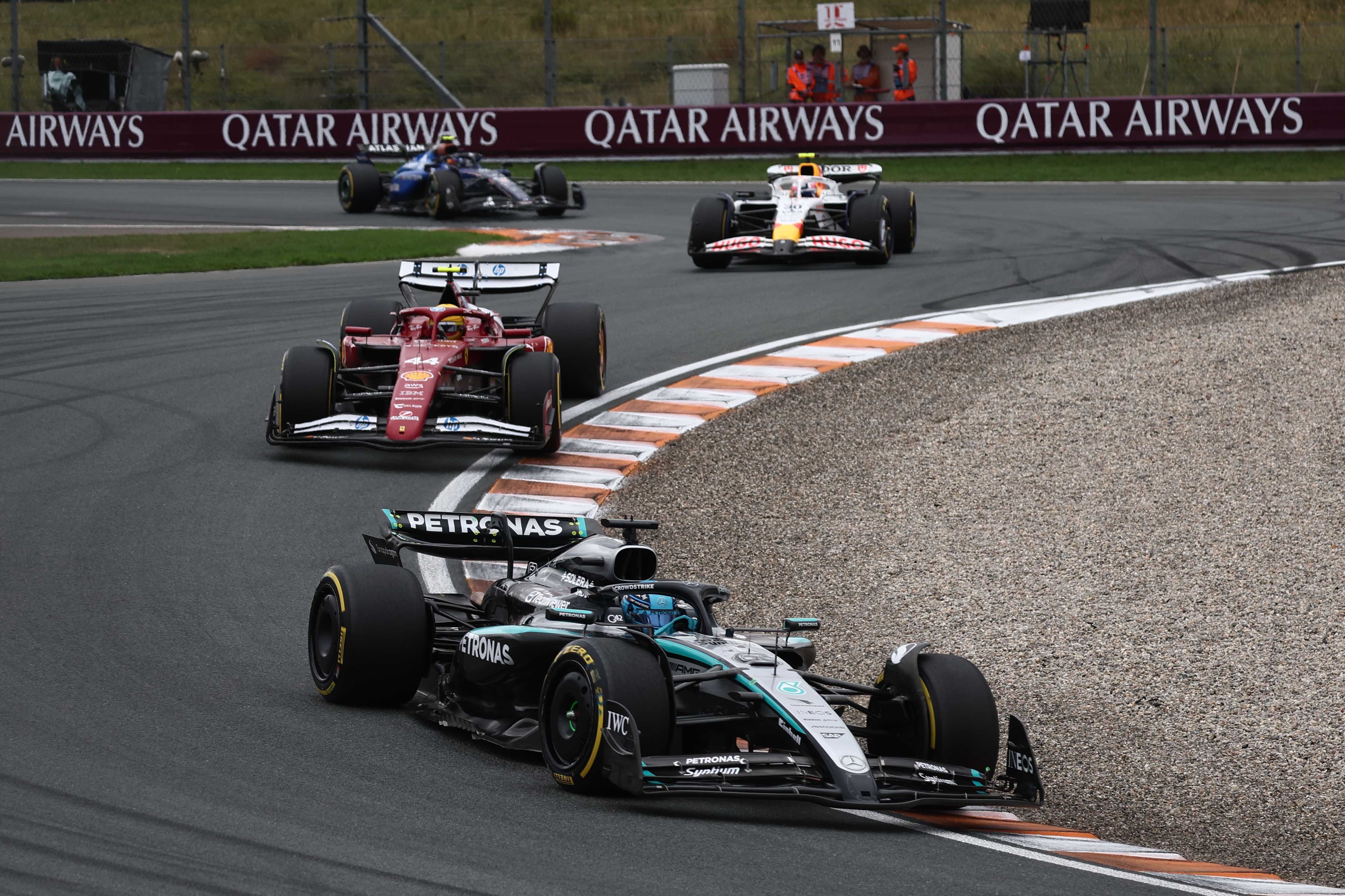 Formula 1 cars racing.