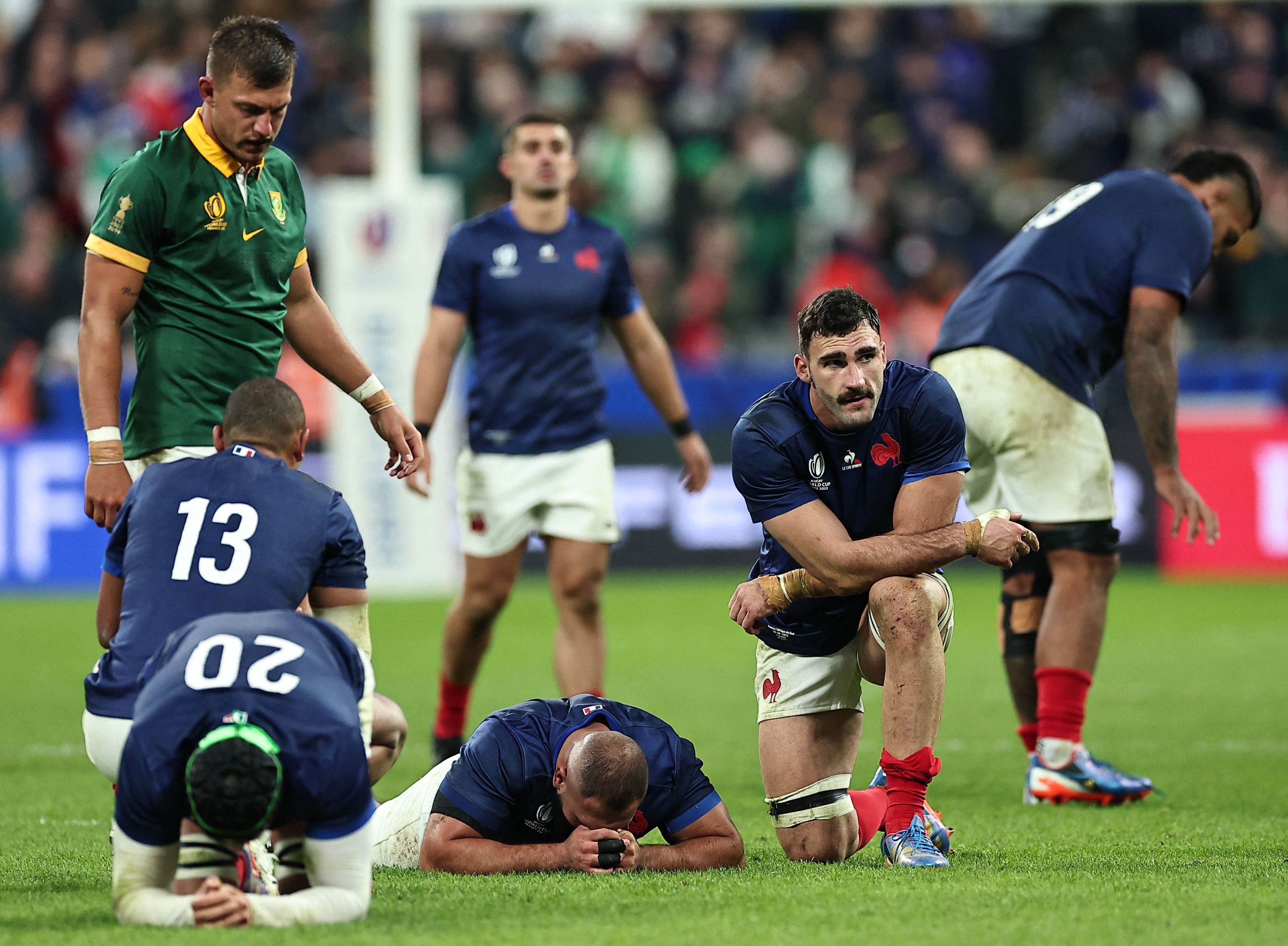 French rugby players reacting to a loss.