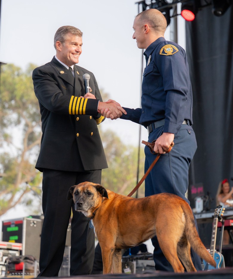Fire Chief Mark Hartwig with firefighter Sam Dudley.