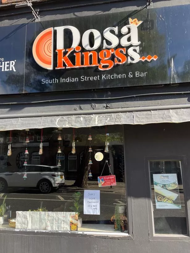 A note in the restaurant's window told customers the restaurant was closed 