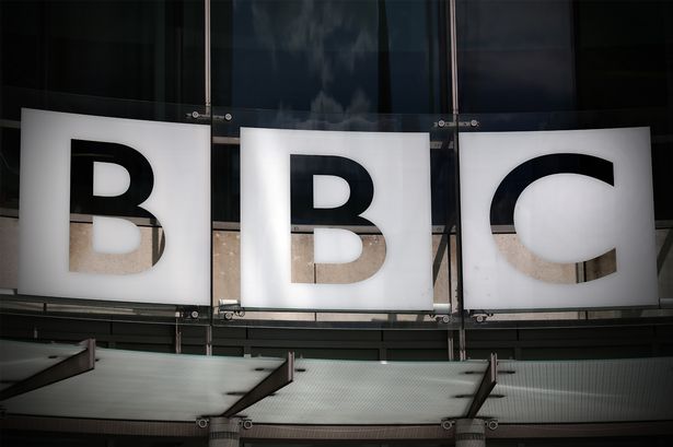   The logo for the Broadcasting House, the headquarters of the BBC is displayed outside on July 25, 2015 in London, England. 