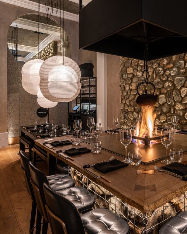 The restaurant's Rikyū Lounge allows guests to sit around a Hibachi table as chefs prepare