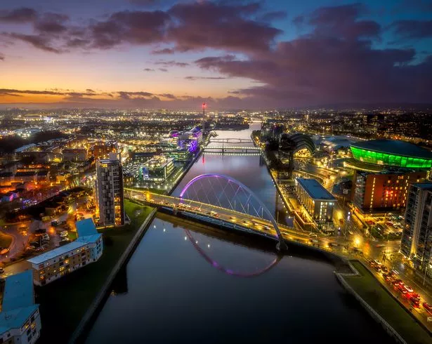 Aerial Clyde river Glasgow with Arc bridge, armadillo convention center and millenium