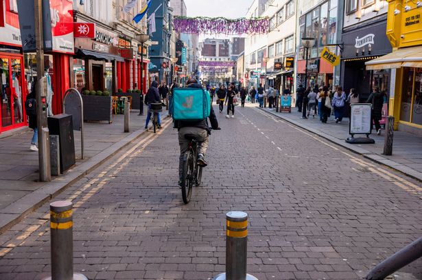 A Deliveroo driver on Bold Street in Liverpool