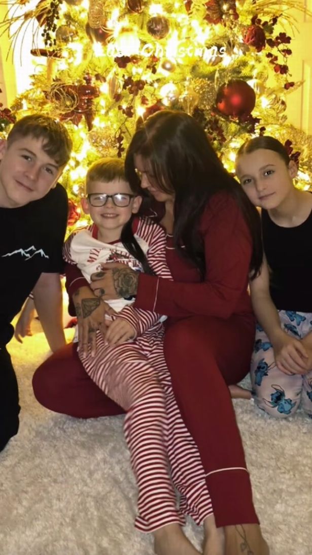 Charlotte celebrating Christmas last year with her children, Harley, Evie and Myles.